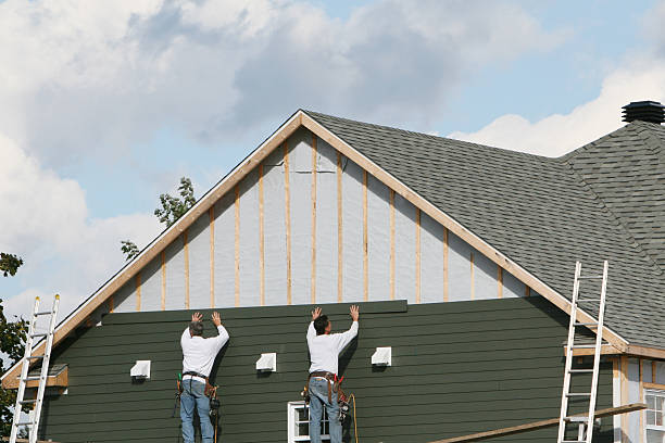 Professional Siding Installation technician working in Hesston, PA